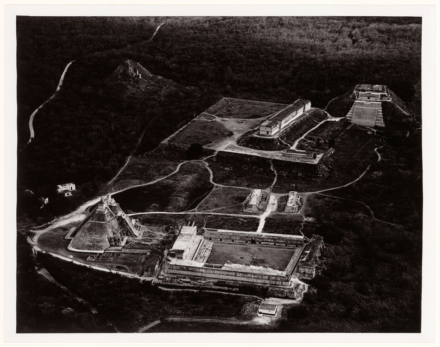 Aerial view of Uxmal Site showing the Nunnery Quadrangle, Pyramid of the Magician, Ballcourt, House of Turtles, Palace of the Governor and the Great Pyramid, Yucatán, Mexico