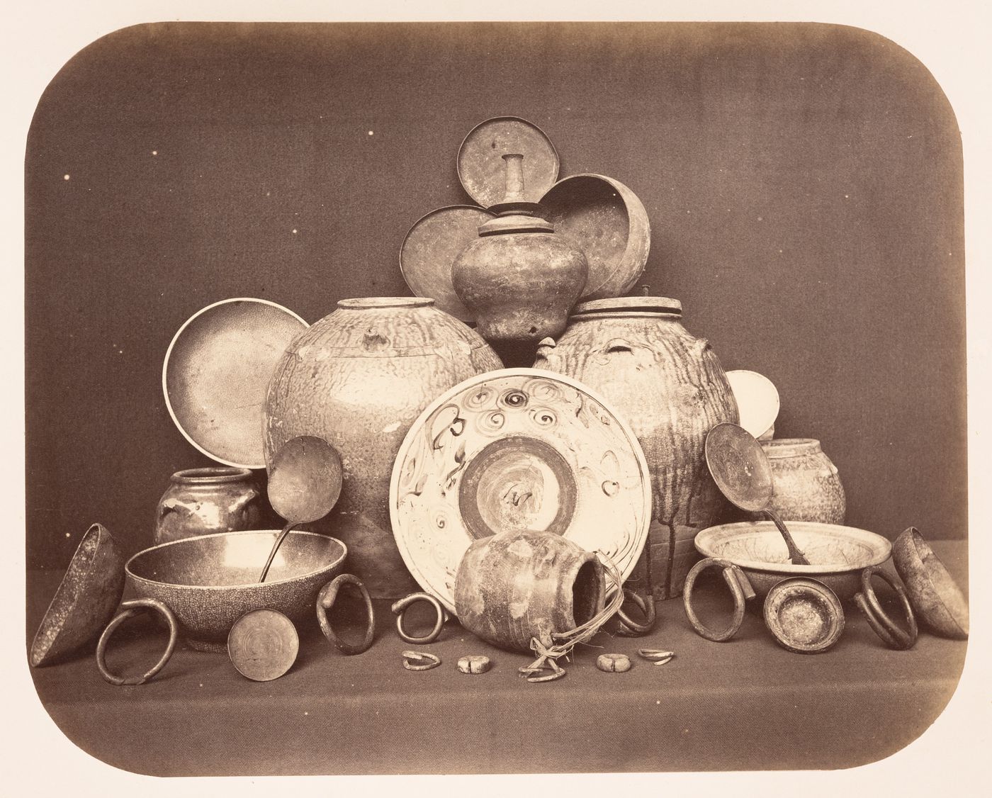 View of ceramic pots, vases, bowls and other utensils, Dutch East Indies (now Indonesia)