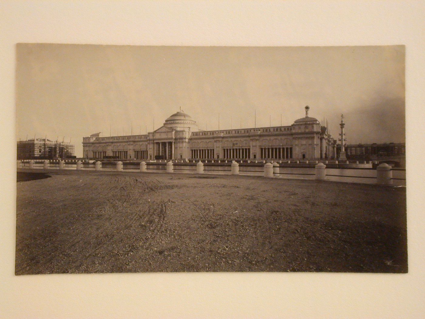 View of the north façade of the Agricultural Building under construction from across the Grand Basin, 1893 Chicago World's Columbian Exhibition, Chicago, Illinois