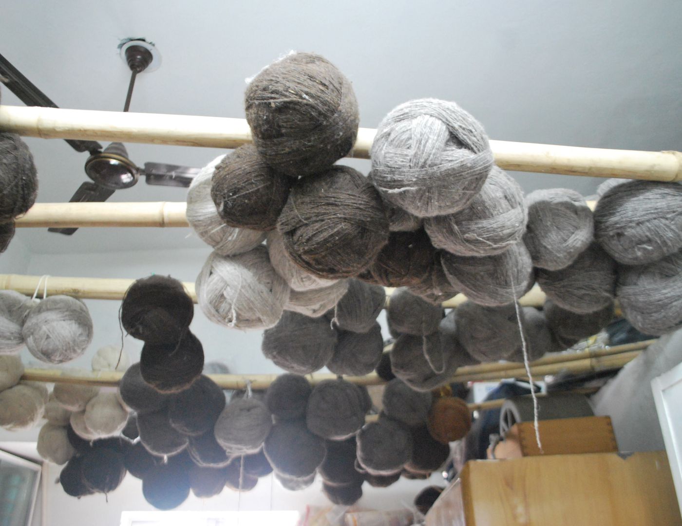 Weavers' Studio : hanging balls of yarn