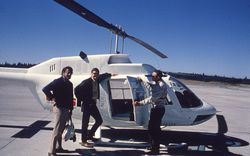 Lawrence Halprin and two associates before their helicopter flight for the Take Part workshop in Everett, 1971