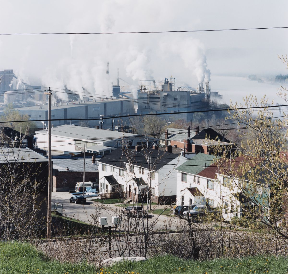Houses Type 171C, Elm St., looking toward the Tembec factory, Témiscaming, 1995